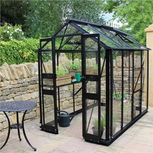 گلخانه شیشه ای حیاط خلوت خانه